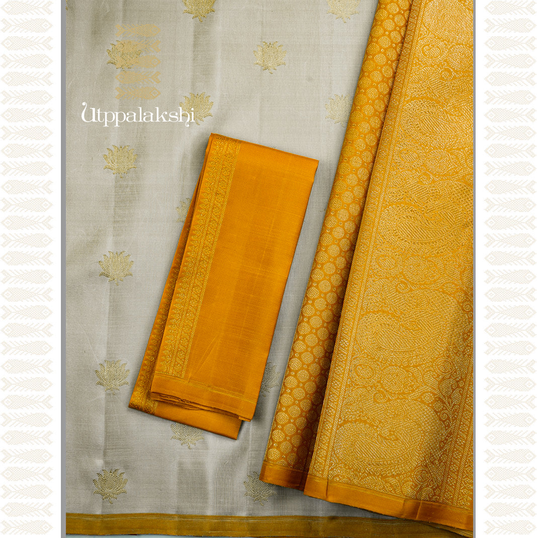 PASTEL CARDAMOM GREEN WITH MUSTARD PALLU -AN UTPPALAKSHI HANDWOVEN KANCHIPURAM SILK SAREE