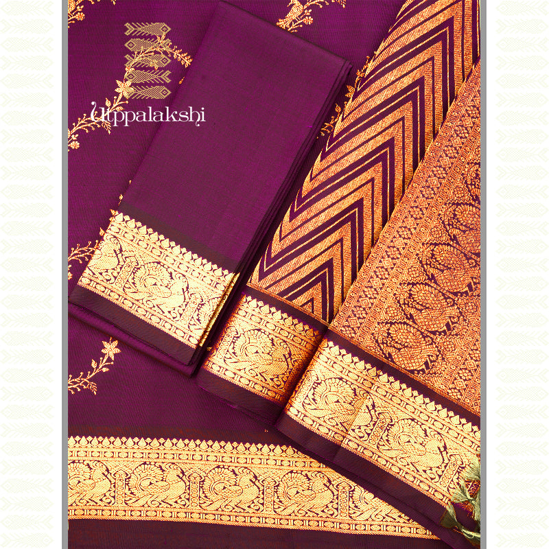 A Wine-Hued Rhapsody of Vines and Wings kanchipuram silk saree
