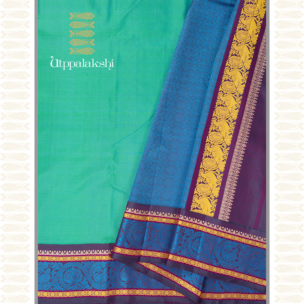 SEA GREEN SAREE WITH PURPLE KORVAI BORDER- AN UTPPALAKSHI HANDWOVEN KANCHIPURAM SILK SAREE
