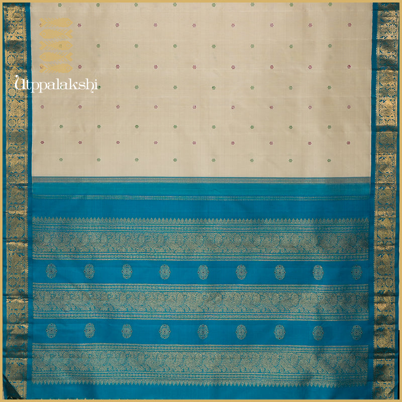 TUSSAR COLOUR SAREE WITH RAMAR BLUE KORVAI BORDER-AN UTPPALAKSHI HANDWOVEN KANCHIPURAM SILK SAREE