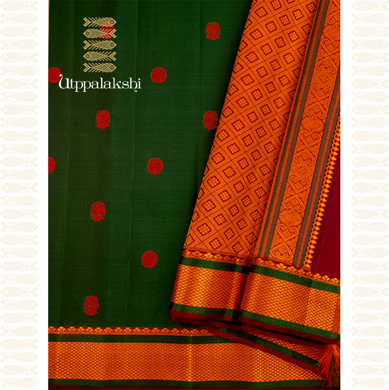 Guarded in Green: A Saree of Power and Grace Drenched in deep bottle green Kanchipuram Silk Saree