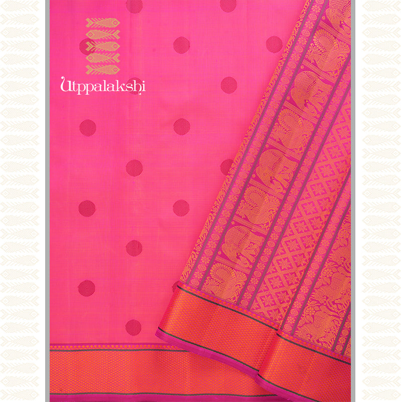 Woven in the warm embrace of orange and pink  Kanchipuram Silk Saree