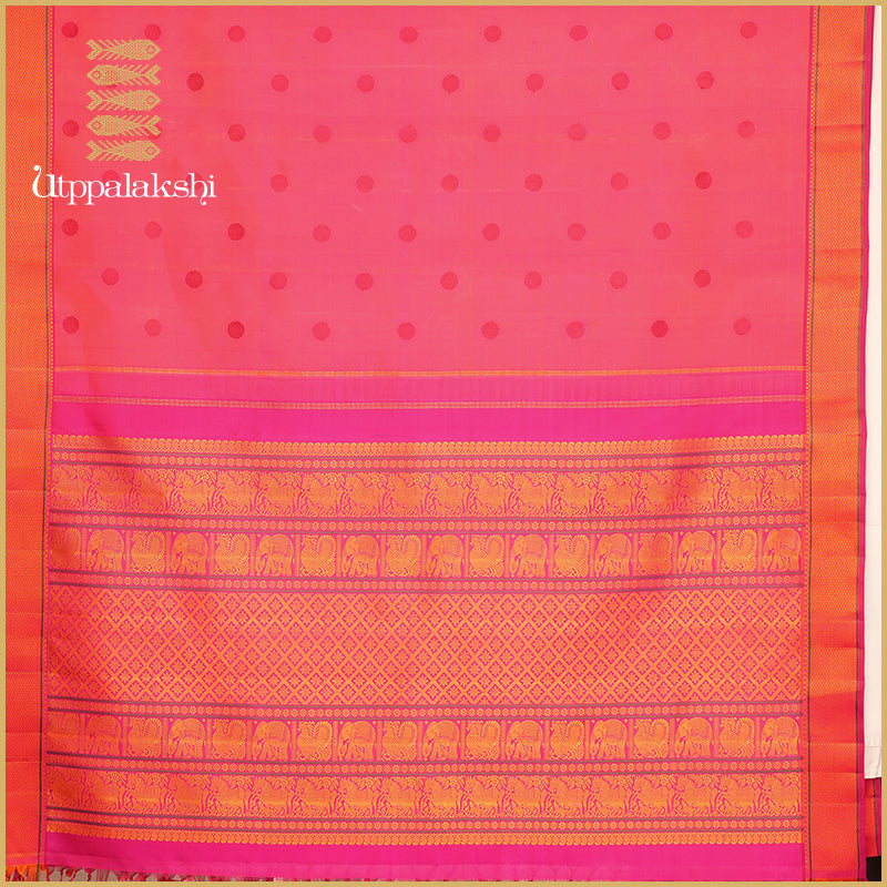 Woven in the warm embrace of orange and pink  Kanchipuram Silk Saree