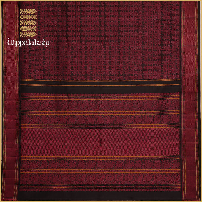 Midnight Motifs: A Dance of Power and Imagination In inky black  Kanchipuram Silk Saree