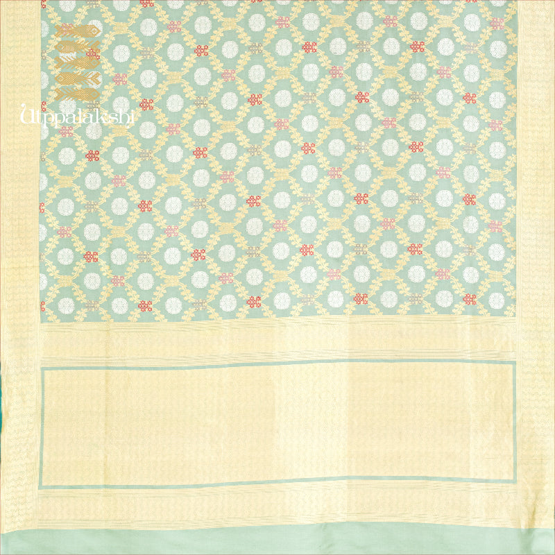 UTPPALAKSHI HANDWOVEN BENARAS SILK SAREE PASTEL GREEN GOLD AND SILVER THREADWORK