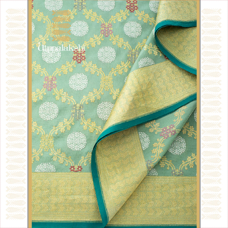 UTPPALAKSHI HANDWOVEN BENARAS SILK SAREE PASTEL GREEN GOLD AND SILVER THREADWORK